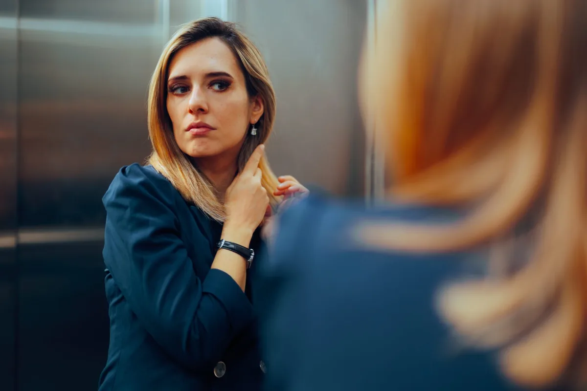 A woman listens during a supportive counseling conversation.